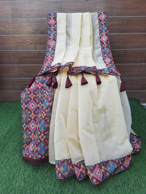 Cream color patola border chanderi silk saree