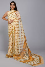 Beige color pure chiffon hand block print saree