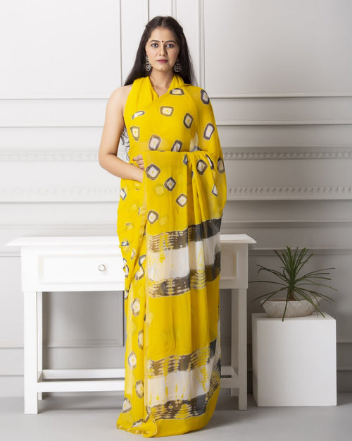 Lemon yellow bandhej print chiffon saree
