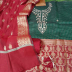 Green color organza zari weaved suit fabric with gotta work