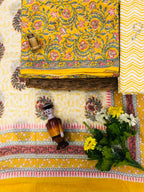 Yellow color cotton suit with cotton mulmul dupatta