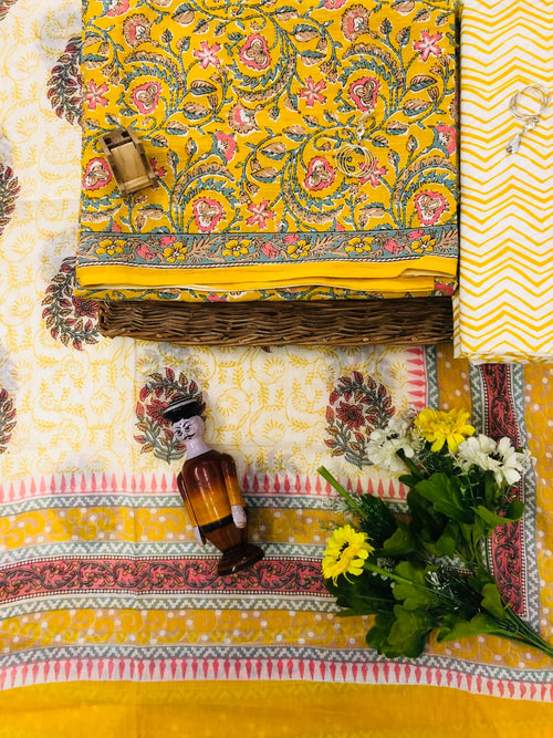 Yellow color cotton suit with cotton mulmul dupatta