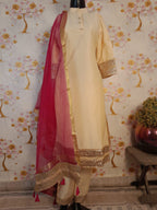 Beige Color designer suit with mirror work embroidery