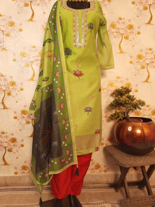 FLORANCE GREEN COLOR MUSLIN SILK WITH HAND WORK AARI SUIT