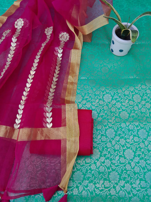 Beautiful Rama Green Banarsi Suit With Organza Gota Patti Dupatta